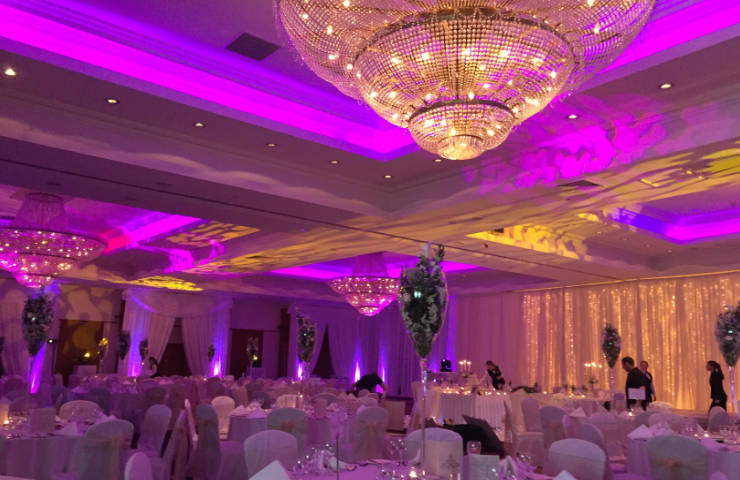 hotel wedding design with pipe and drape in white and ivory