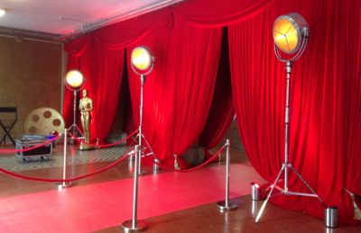Hollywood red curtains entrance design with hollywood movie lights