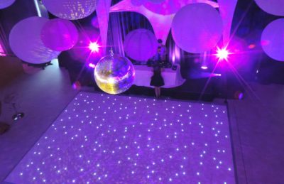 disco party with a white twinkle dance floor rental and disco ball