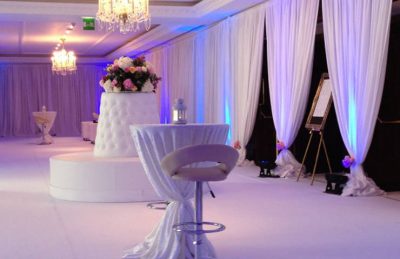 Wedding hotel interiors design with white drapery and white furniture