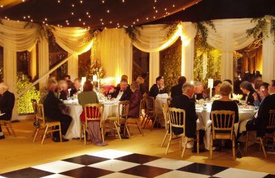 wedding marquees interiors in black and white design with chequered dance floor rental